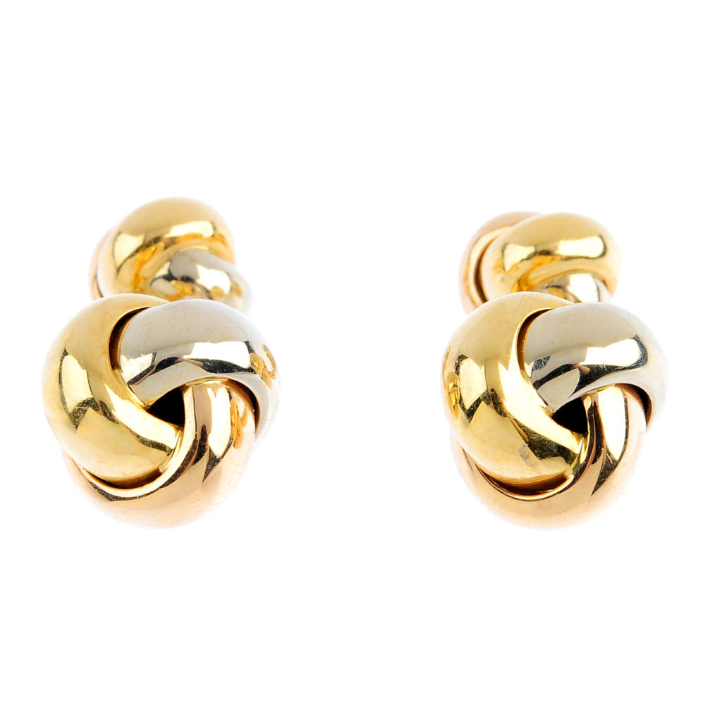 modern jewellery auction - CARTIER - a pair of 'Trinity' cufflinks.
