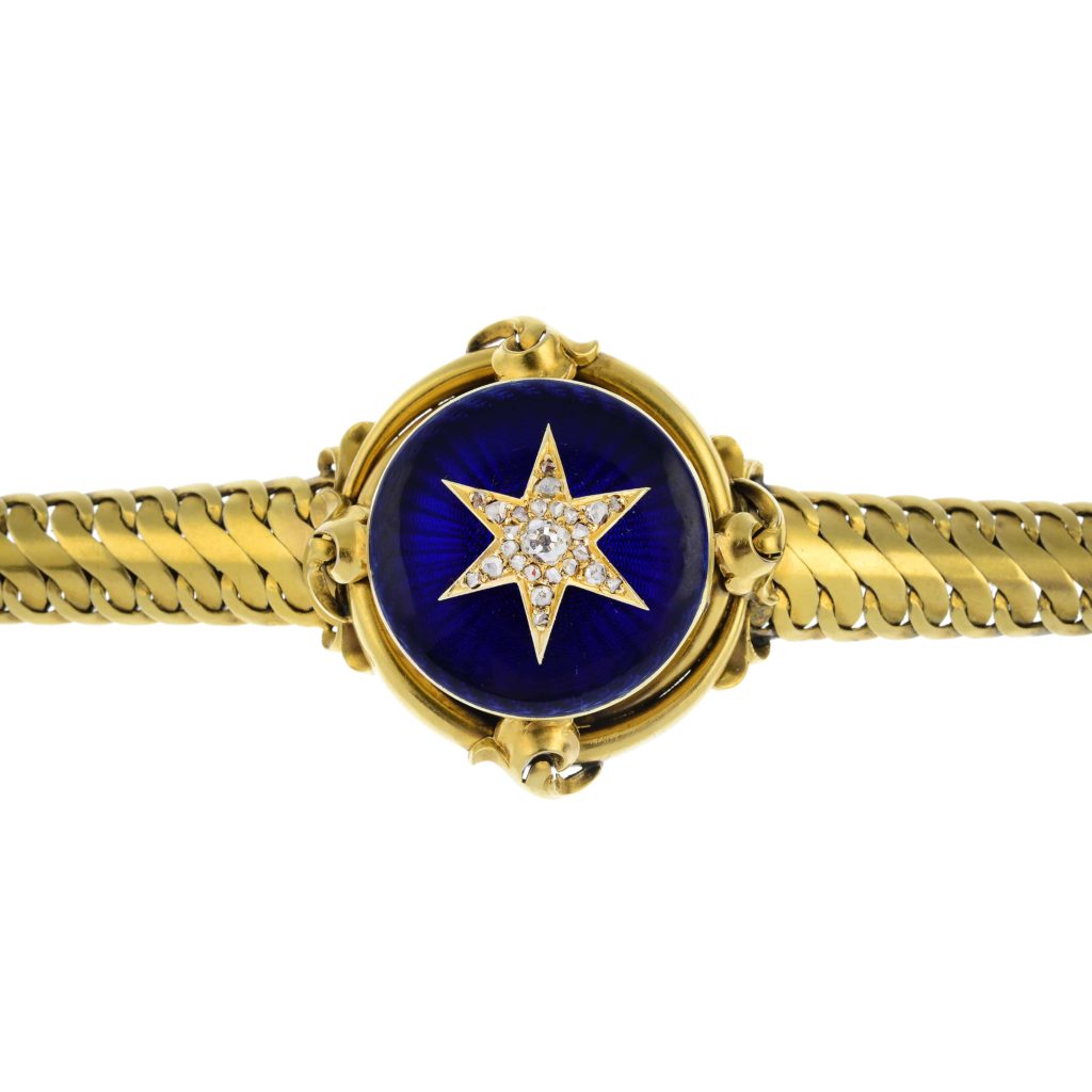 A mid Victorian gold diamond enamel locket bracelet.