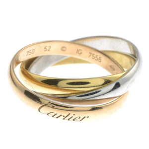 A “Trinity” ring, by Cartier