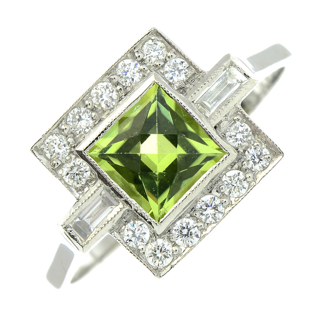 Birthstone for August: Peridot 4 diamond dress ring