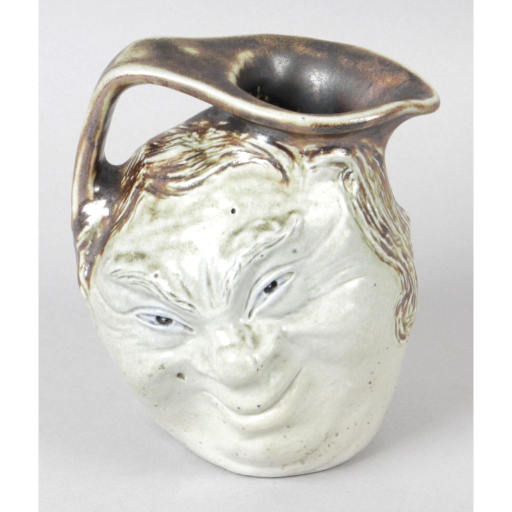 Martin Brothers pottery 'face mask' jug