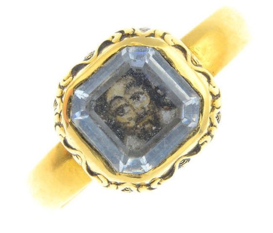 A late 17th century gold Stuart crystal Memento Mori portrait miniature ring, depicting Charles I.