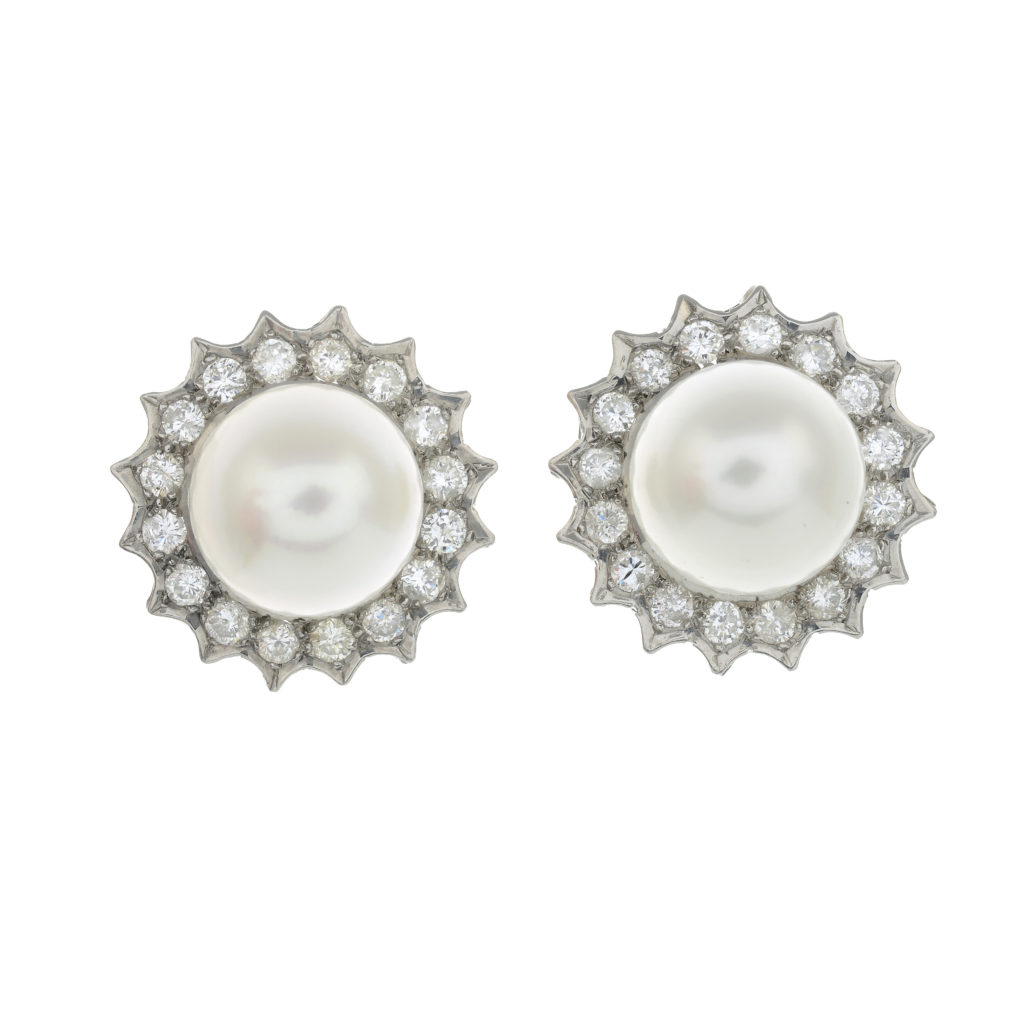A pair of cultured pearl and brilliant-cut diamond earrings