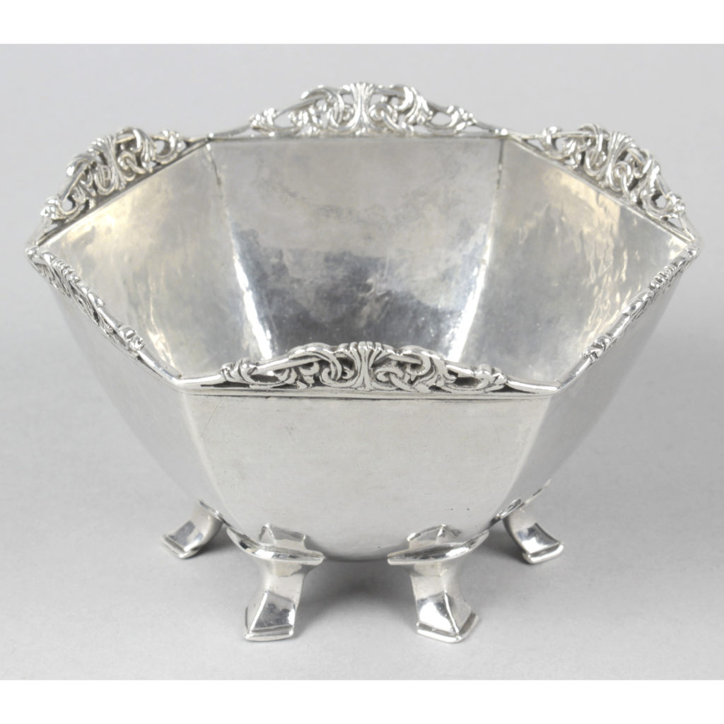 An Arts & Crafts style silver bowl by Omar Ramsden