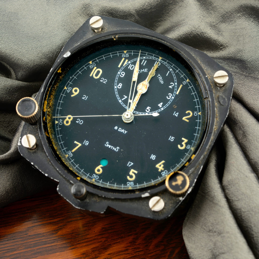 Cockpit clocks. A military 8-day chronograph aircraft clock by Smiths, 83mm.