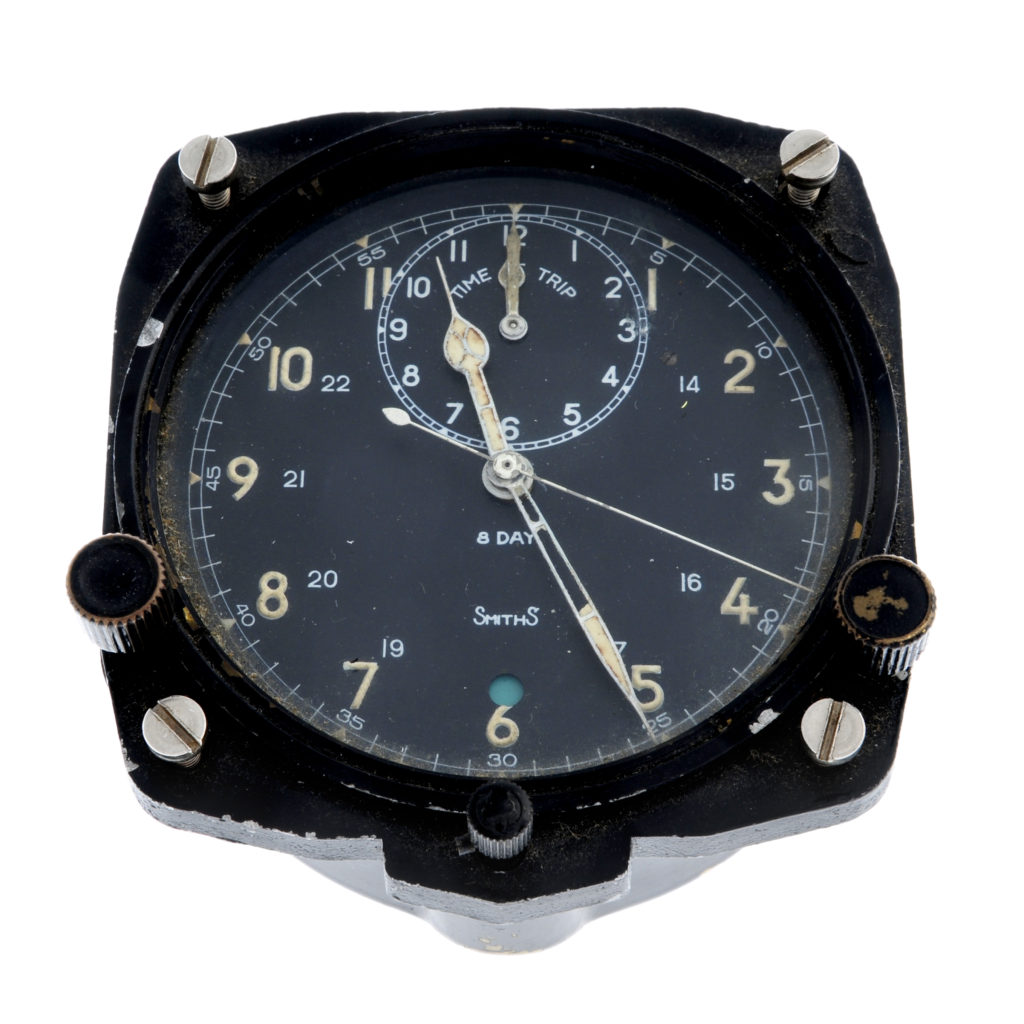 Cockpit clocks - this one Smiths. A military 8-day chronograph aircraft clock by Smiths, 83mm.