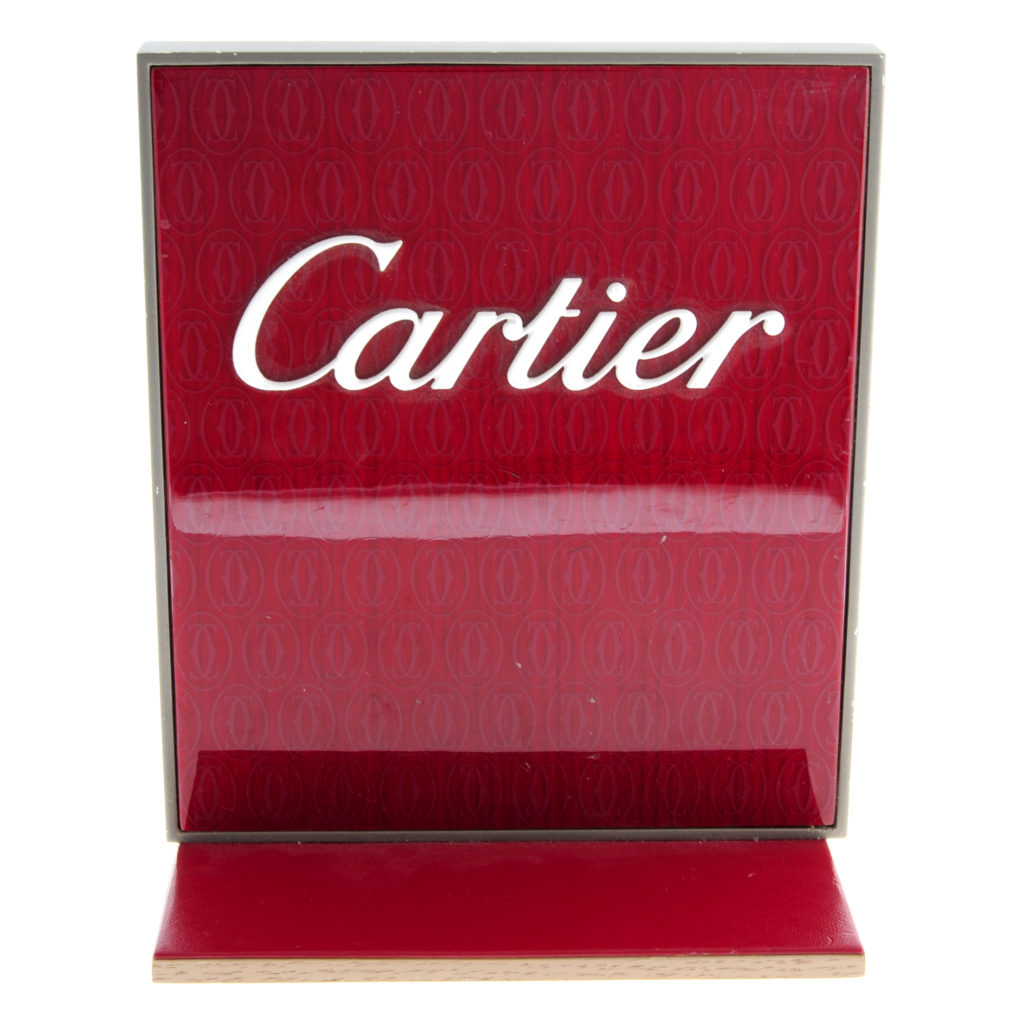 A group of watch display items to include stands by Cartier. Approximately 25.